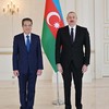 Посол Данг Минь Кхой и Президент Азербайджана Ильхам Алиев. Фото: baoquocte.vn