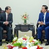 Вице-премьер Чан Хонг Ха и г-наЦяо Сюбинь, генеральный директор группы Energy China. Фото: VGP