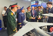 Делегация Вьетнама на выставке. Фото: ВИА