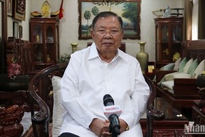 Бывший Генеральный секретарь ЦК НРПЛ, Президент Лаоса Буннянг Ворачит. Фото: Чинь Зунг