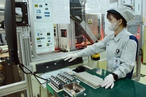 Производство печатных плат на заводе Nippon Mektron (провинция Хынгйен). Фото: Чан Хай