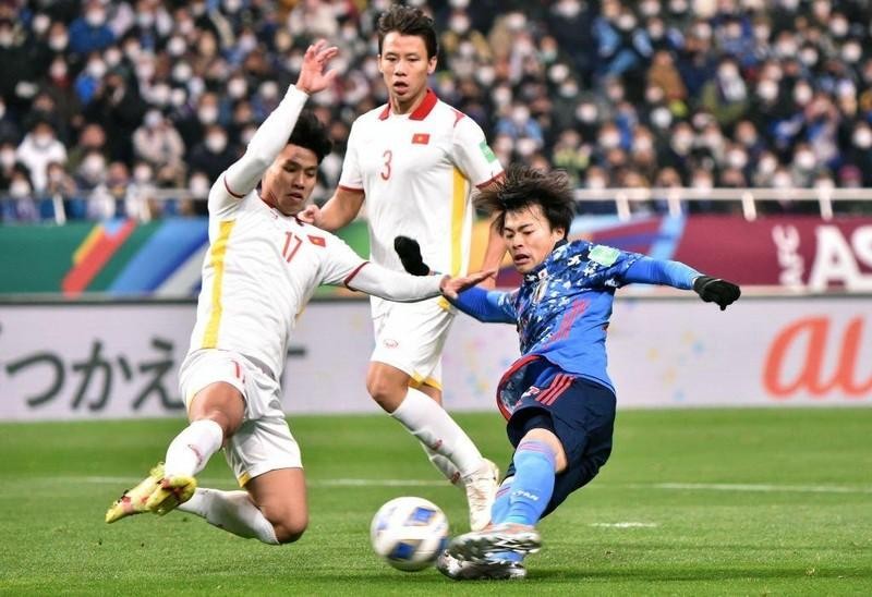 Сборная Вьетнама в матче против сборной Японии. Фото: Getty