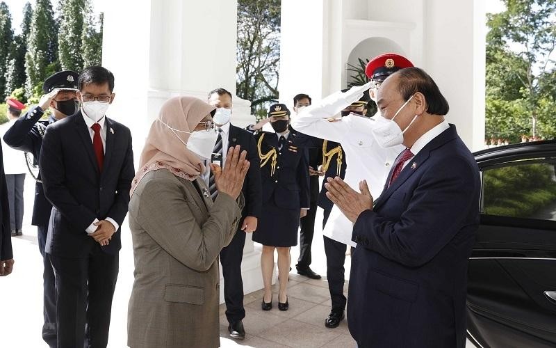 Президент Нгуен Суан Фук посетил Сингапур с государственным визитом в феврале 2022 года. Фото: VNA