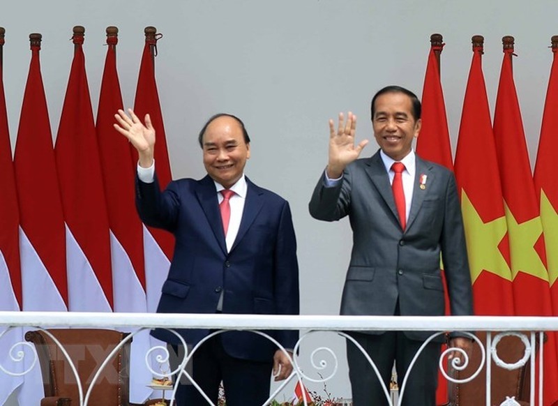 Президент Вьетнама Нгуен Суан Фук и Президент Индонезии Джоко Видодо. Фото: ВИА 