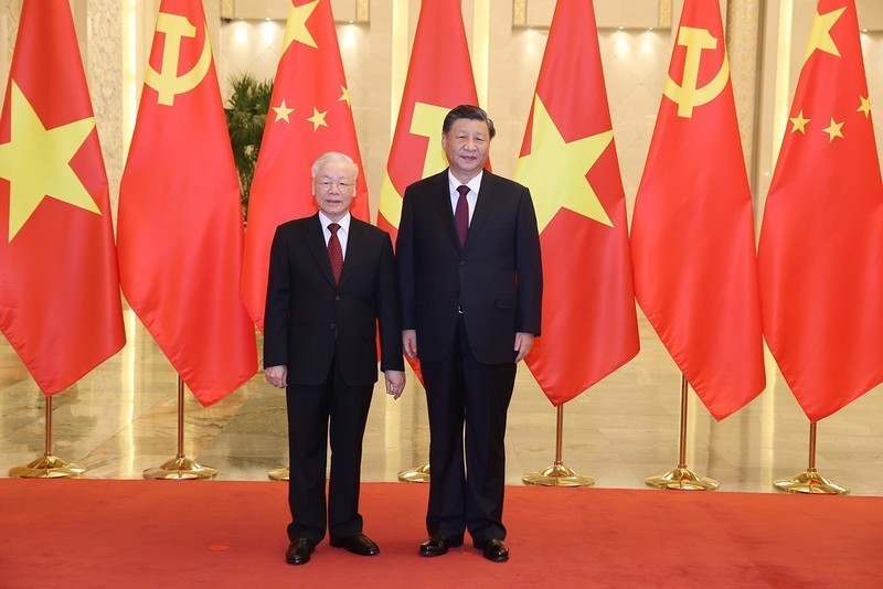 Генеральный секретарь ЦК КПВ Нгуен Фу Чонг (слева) и Генеральный секретарь ЦК КПК, Председатель Китая Си Цзиньпин.