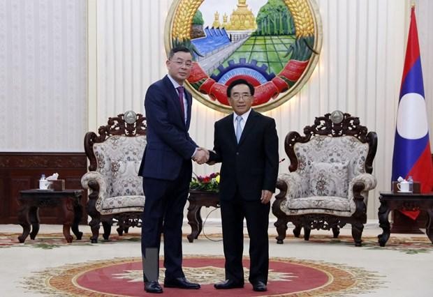 Генеральный аудитор Вьетнама Нго Ван Туан и Премьер-министр Лаоса Фанкхам Випхаван. Фото: ВИА