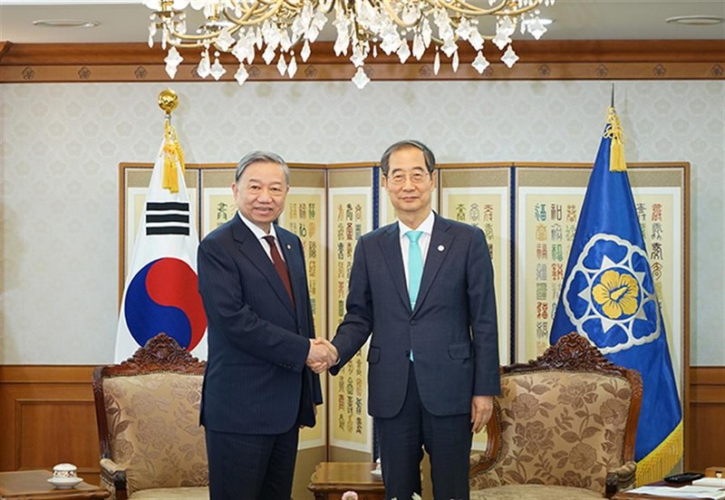 Министр общественной безопасности То Лам и Премьер-министр Южной Кореи Хан Док Су. Фото: bocongan.gov.vn