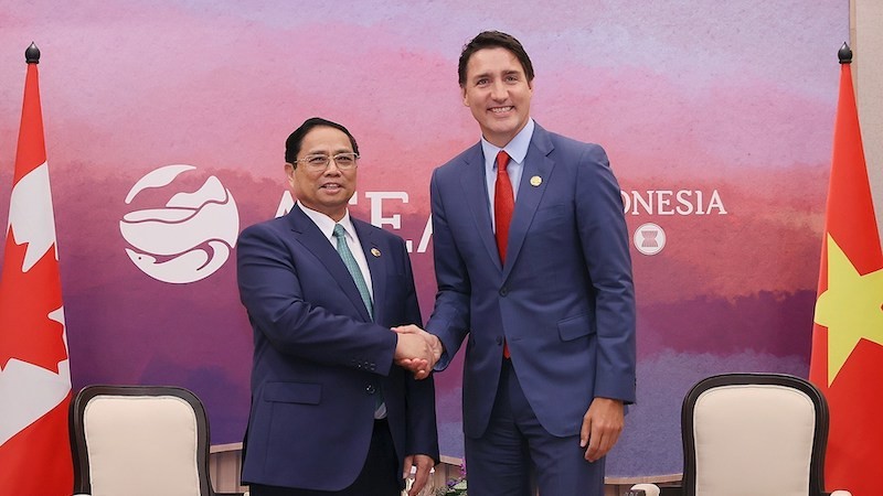 Премьер-министр Фам Минь Тьинь и Премьер-министр Канады Джастин Трюдо. Фото: ВИА
