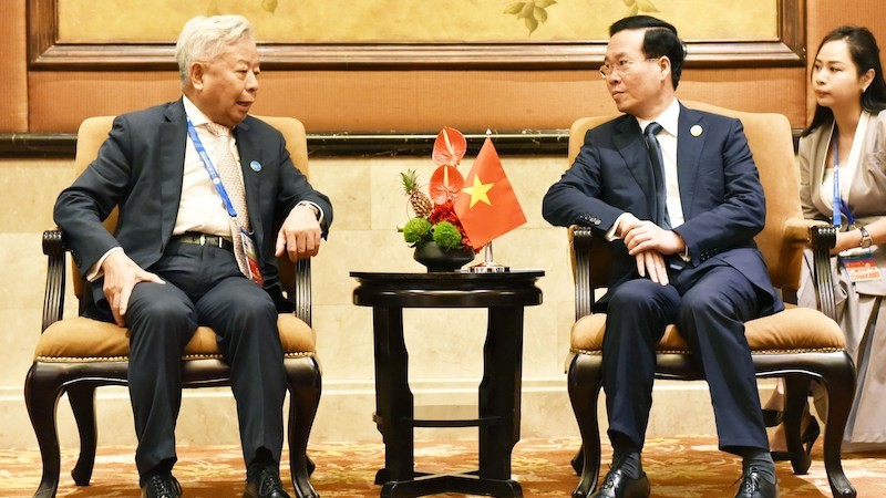 Президент Во Ван Тхыонг и Президент АБИИ Цзинь Лицюнь. Фото: ВИА