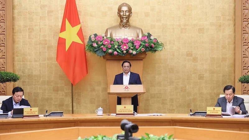 Премьер-министр Фам Минь Тьинь выступает на заседании. Фото: ВИА