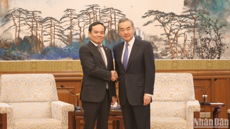 Вице-премьер Чан Лыу Куанг и Заведующий Канцелярией Комиссии ЦК КПК по иностранным делам, Министр иностранных дел Китая Ван И.