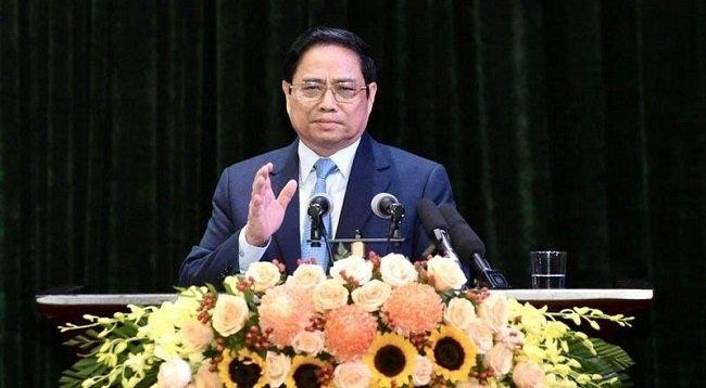 Премьер-министр Вьетнама Фам Минь Тьинь выступает с речью. Фото: Чан Хай