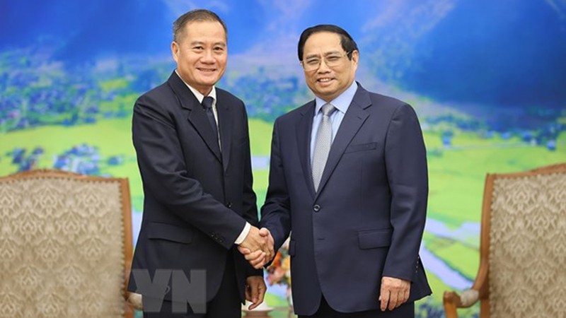 Премьер-министр Фам Минь Тьинь принимает Генерального директора «Pathet Lao» Кхамфея Филафу. Фото: ВИА