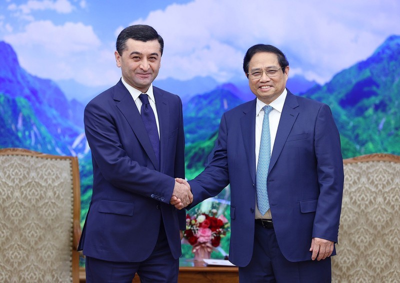 Премьер-министр Фам Минь Тьинь и Министр иностранных дел Узбекистана Бахтиёр Саидов. Фото: Чан Хай