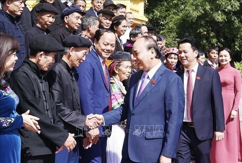 Президент Нгуен Суан Фук на встрече с делегацией. Фото: VNA