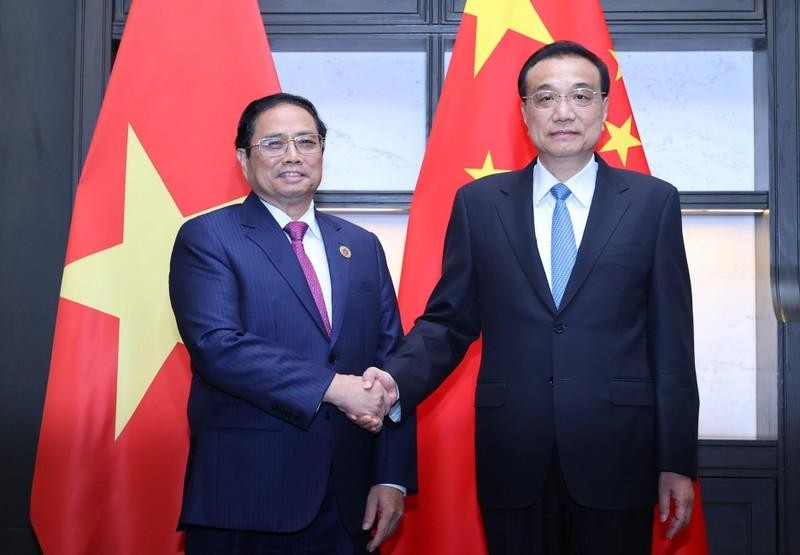 Премьер-министр Вьетнама Фам Минь Тьинь и Премьер Госсовета Китая Ли Кэцян.