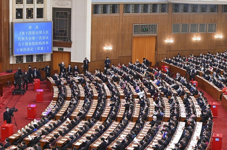 Депутаты Всекитайского собрания народных представителей на сессии. Фото: Синьхуа