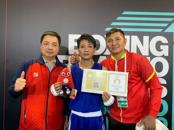Вьетнамская боксерша Во Тхи Ким Ань (в центре). Фото: Федерация бокса Вьетнама