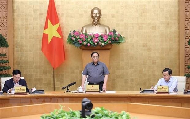 Премьер-министр Фам Минь Тьинь выступает с руководящей речью. Фото: ВИА