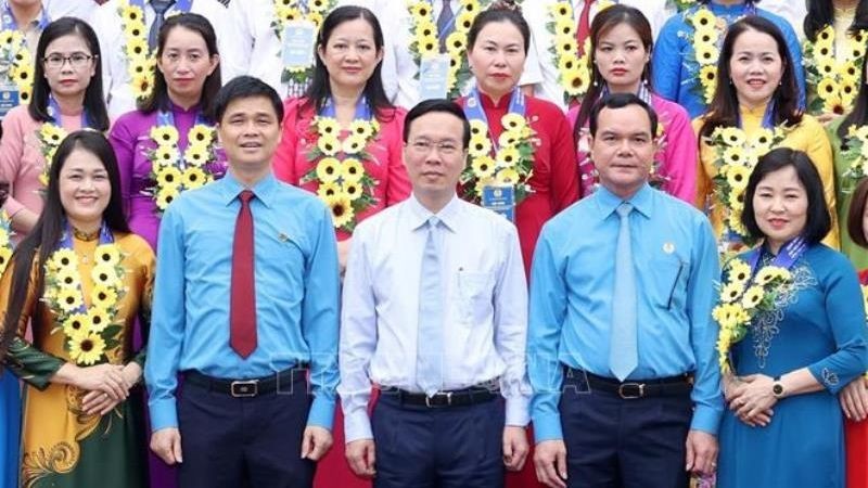 Президент Во Ван Тхыонг и участники встречи. Фото: ВИА