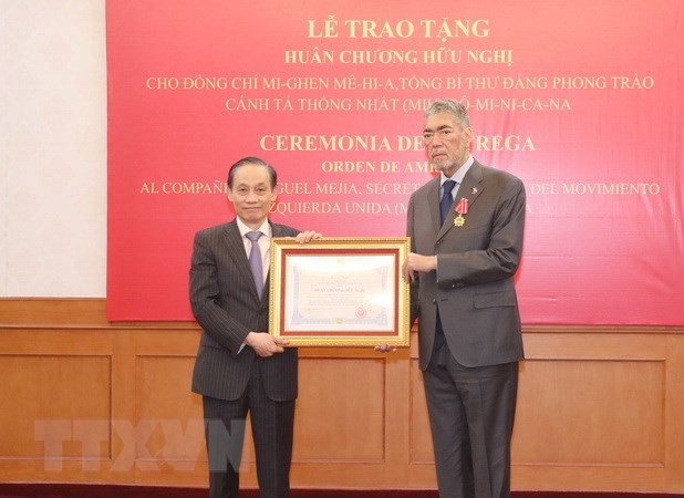 Церемония вручения Ордена Дружбы Генеральному секретарю партии MIU. Фото: ВИА