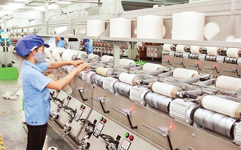 Текстильная компания «Jasan Việt Nam» (с капиталом китайских инвесторов) в индустриальном парке Фоной Б в провинции Хыонгйен. Фото: Данг Зюи