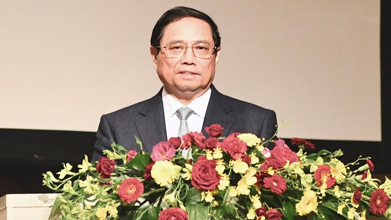 Премьер-министр Фам Минь Тьинь выступает на Вьетнамско-японском экономическом форуме. 