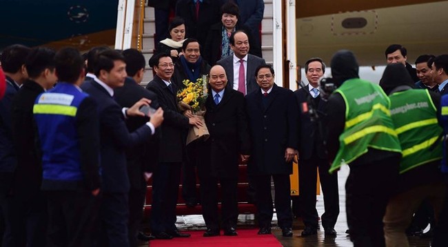 Церемония встречи Премьер-министра Нгуен Суан Фука на международном аэропорту Вандон. Фото: soha.vn