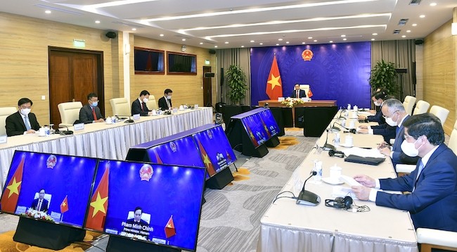 Премьер-министр Вьетнама Фам Минь Тьинь выступает на конференции. Фото: VGP