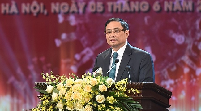 Премьер-министр Фам Минь Тьинь выступает на церемонии. Фото: VGP