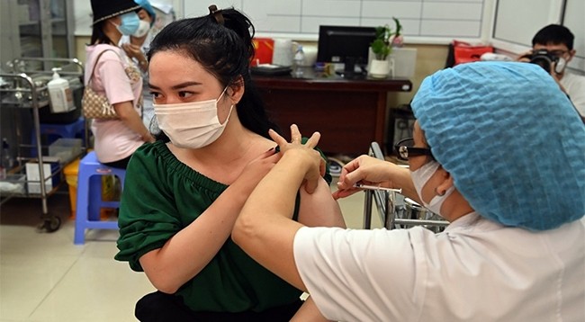 Вакцинация против Covid-19 во Вьетнаме. Фото: Зюи Линь