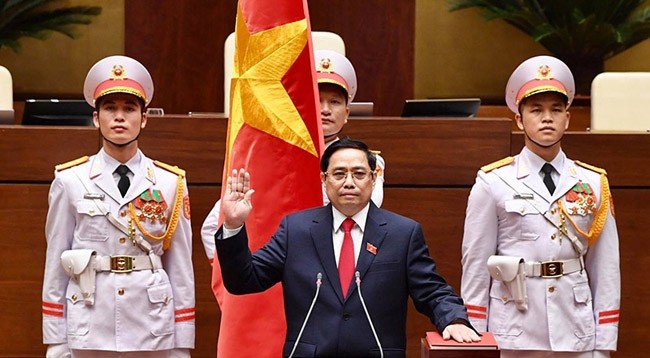Премьер-министр Фам Минь Тьинь на церемонии приведения к присяге. Фото: Зюи Линь