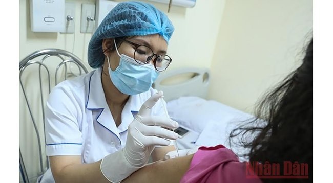 Вакцинация от Covid-19 во Вьетнаме. Фото: Зюи Линь