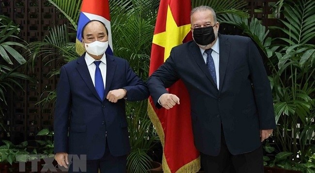 Президент Вьетнама Нгуен Суан Фук и Премьер-министр Кубы Мануэль Марреро Крус. Фото: VNA