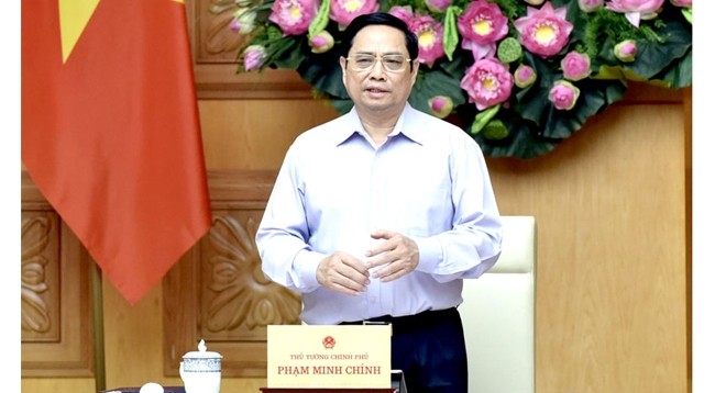 Премьер-министр Вьетнама Фам Минь Тьинь выступает на конференции. Фото: Чан Хай