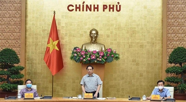 Премьер-министр Вьетнама Фам Минь Тьинь выступает на заседании. Фото: Чан Хай