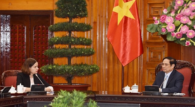 Премьер-министр Фам Минь Тьинь и Посол Робин Муди на приеме. Фото: Чан Хай