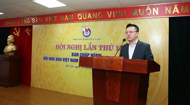 Председатель Союза журналистов Вьетнама Ле Куок Минь выступает с речью. Фото: VNA