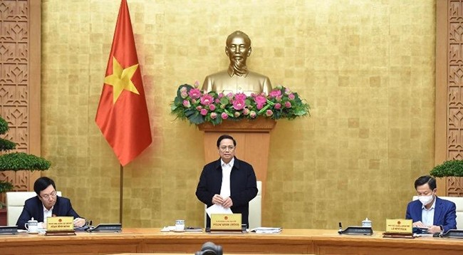 Премьер-министр Фам Минь Тьинь выступает с речью на заседании. Фото: Чан Хай