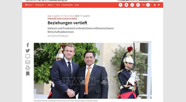 Статья в немецкой газете «Junge Welt» об официальном визите Премьер-министра Фам Минь Тьиня во Французскую Республику. Фото: VNA