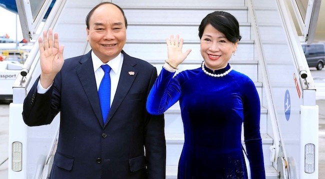 Президент Нгуен Суан Фук с супругой. Фото: VNA