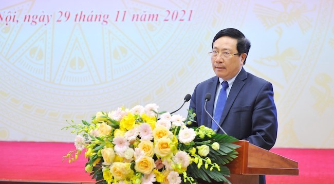 Постоянный вице-премьер Фам Бинь Минь выступает на семинаре. Фото: VNA