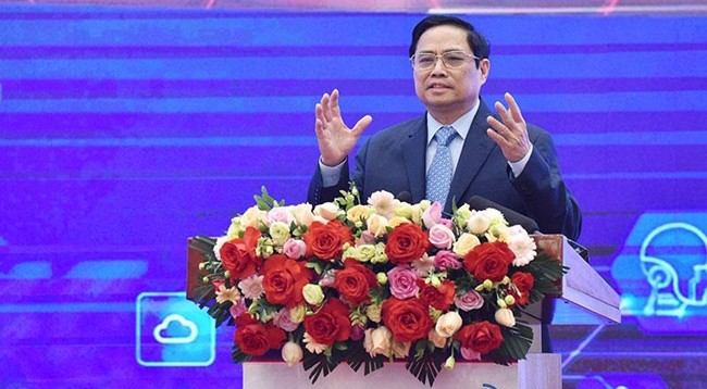 Премьер-министр Вьетнама Фам Минь Тьинь выступает на форуме. Фото: Чан Хай