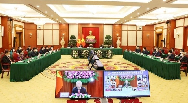 Высокопоставленная делегация КПВ принимает участие в саммите Коммунистической партии Китая и мировых политических партий. Фото: VNA