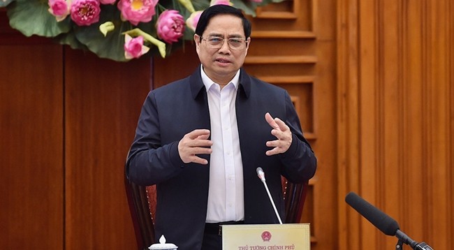 Премьер-министр Фам Минь Тьинь. Фото: Чан Хай 