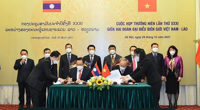 Церемония подписания памятного протокола между двумя сторонами. Фото: МИД Вьетнама 