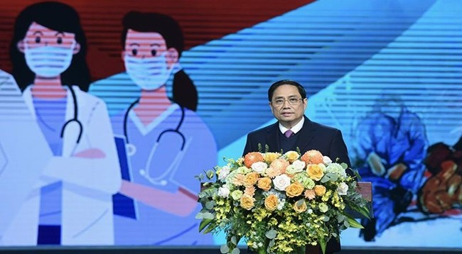 Премьер-министр Вьетнама Фам Минь Тьинь выступает с речью. Фото: Чан Хай