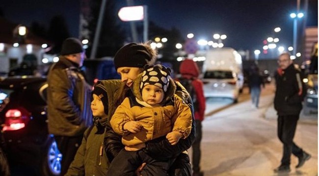 Беженцы из Украины на польско-украинском пограничном переходе в Гребенне, 3 марта 2022 г. Фото: PAP/VNA