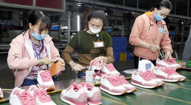 Линия по производству обуви для экспорта компании Хонган (провинция Хоабинь). Фото: vietnamplus.vn