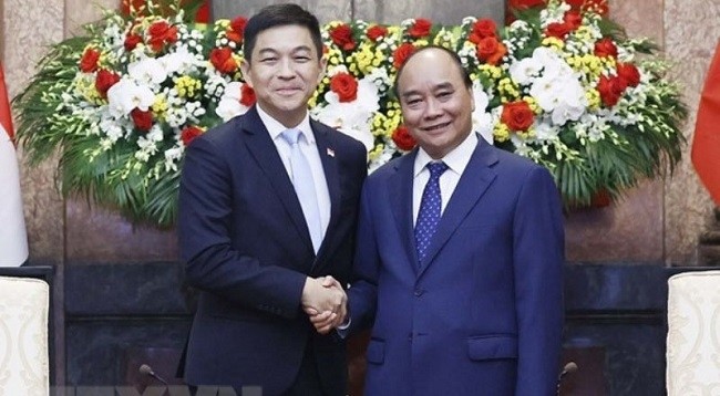 Президент Вьетнама Нгуен Суан Фук (справа) и Председатель Парламента Сингапура Тан Чуан-Джин. Фото: VNA